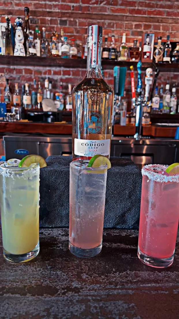 Colorful cocktail lineup at our bar