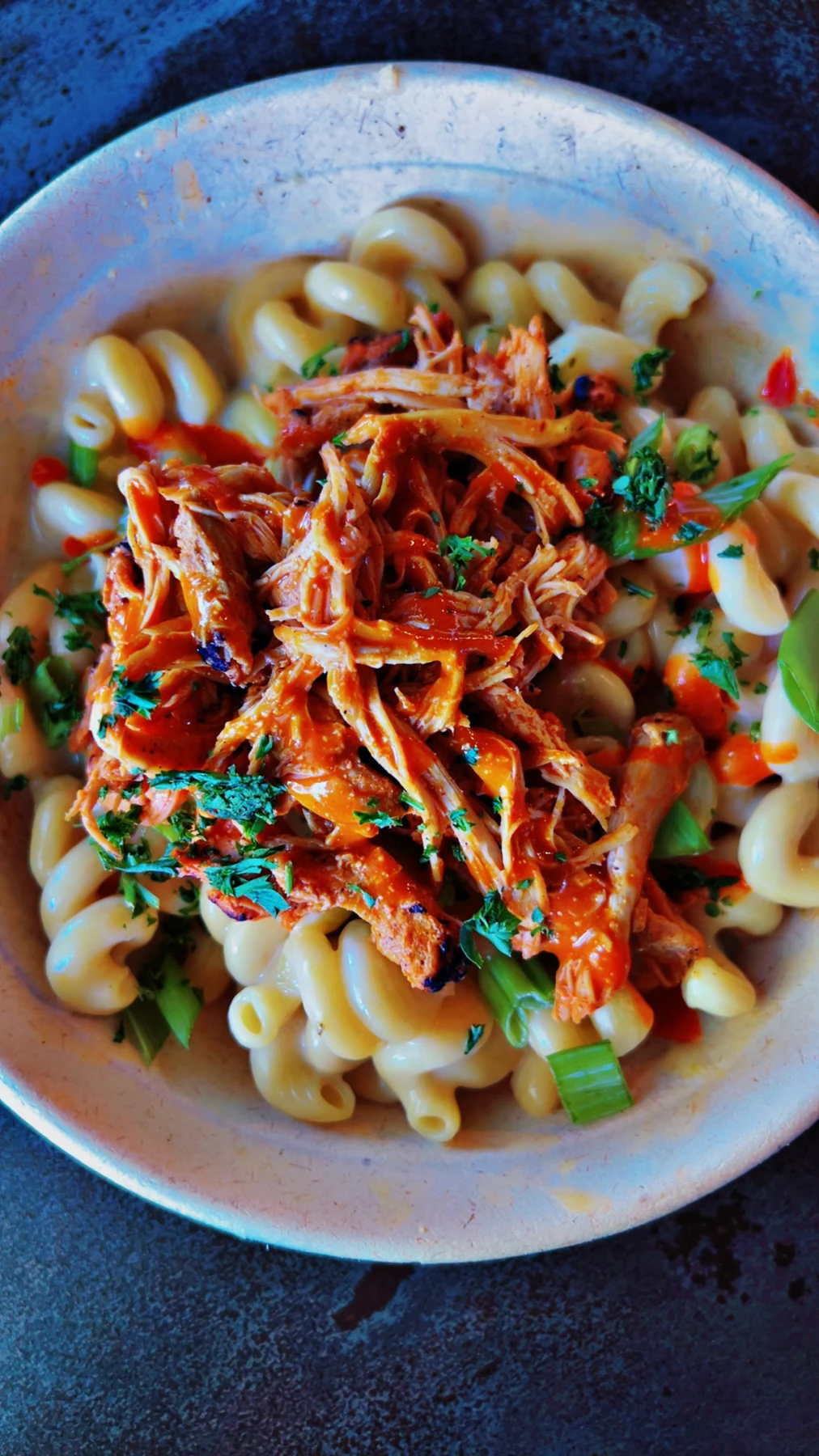 Mac N Cheese with turkey burnt ends and green onions at Royal James